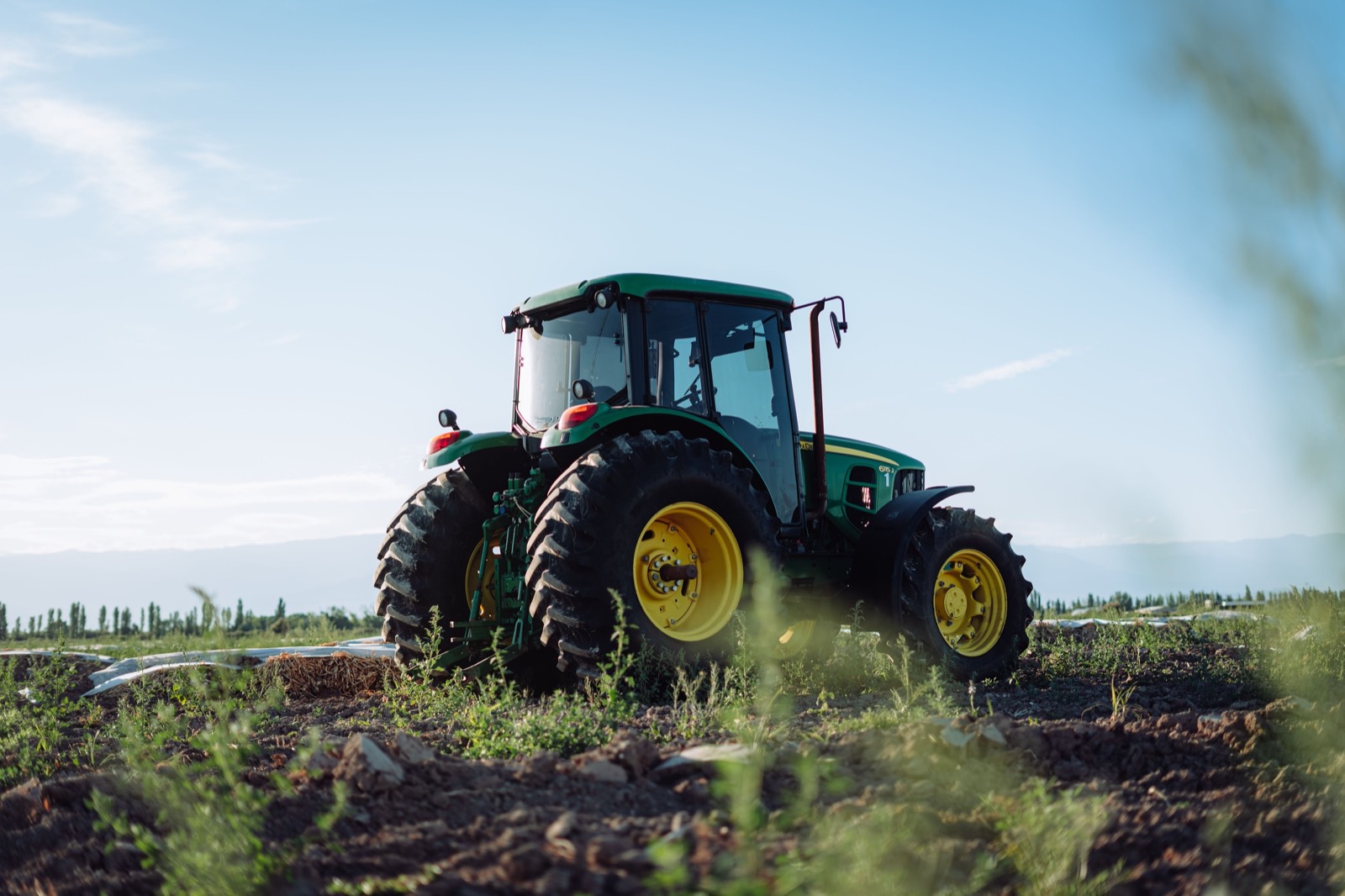 Compact tractor in a field
